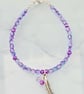 Purple and blue feather charm bracelet  - Image 1