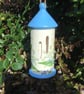 Garden Ornament. Butterfly house. Lily of the Valley. Forget me Not.