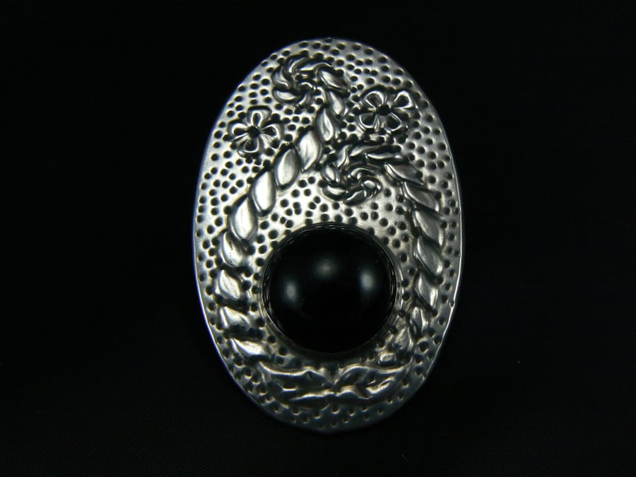 Pewter brooch with large black stone