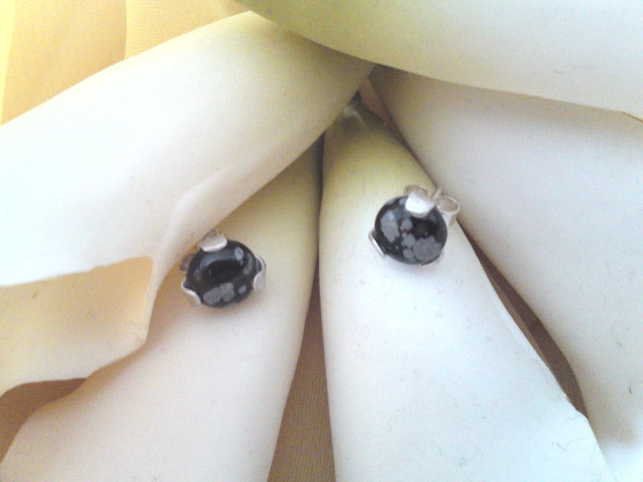 Claw set snowflake obsidian studs