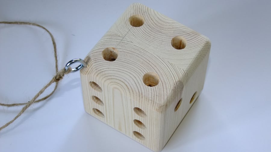 Dice shaped bug, ladybird or insect shelter for wild creatures in the garden 