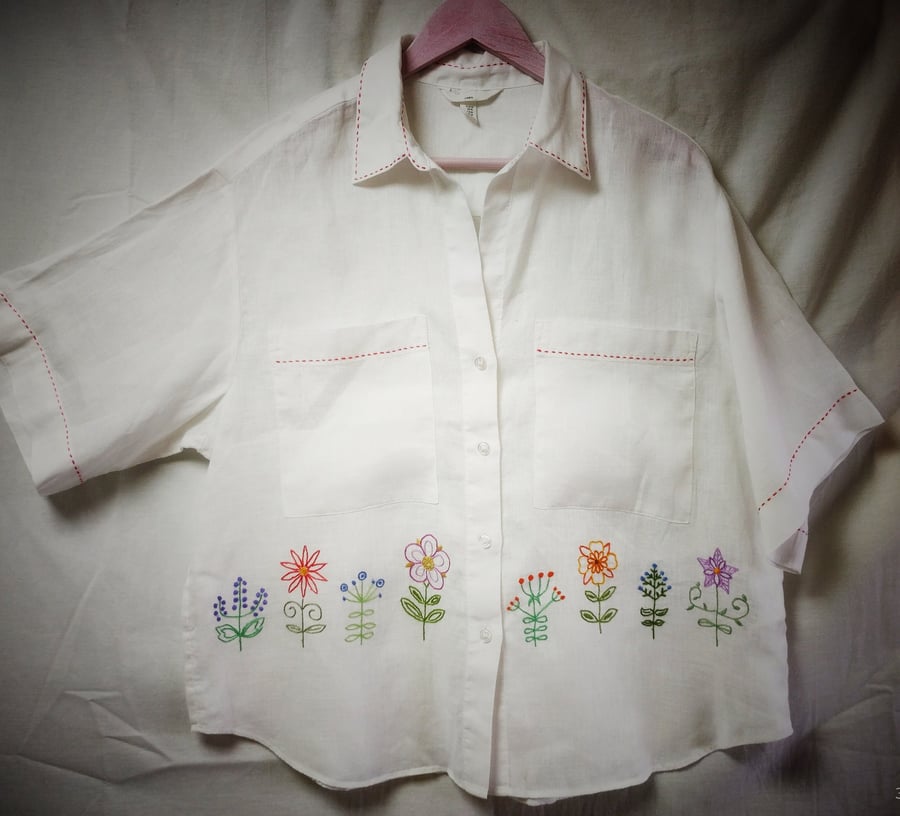 Hand embroidered white linen blouse