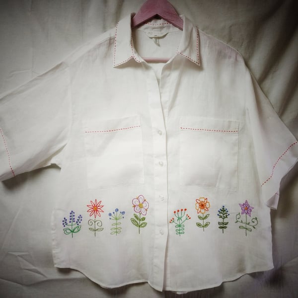 Hand embroidered white linen blouse