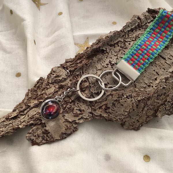 Hand woven key fob with a planetary "Nebula" embellishment orb