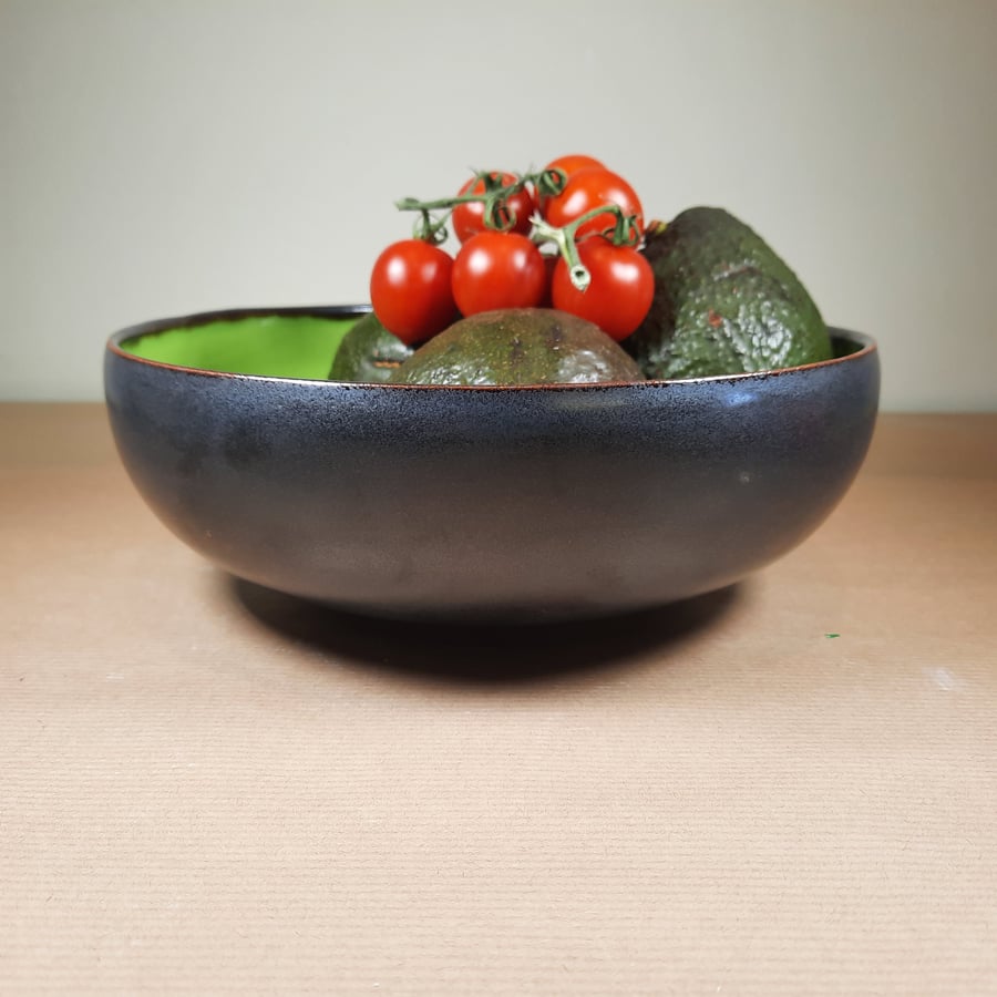 A Hand made lime green ceramic bowl