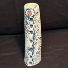 Tall impressed vase