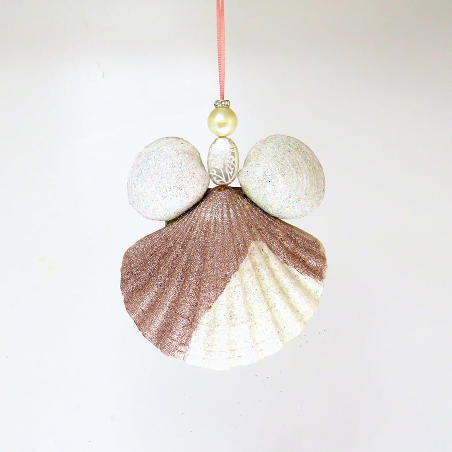Pretty handmade guardian angel ornament to hang on the tree or in a window