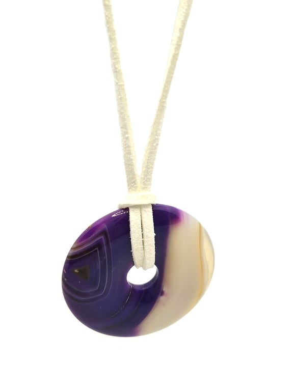 Purple dyed agate donut pendant with faux white leather cord