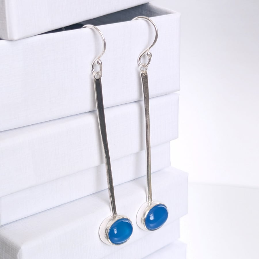 Eye catching long dangle blue onyx earrings