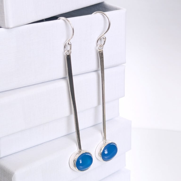Eye catching long dangle blue onyx earrings
