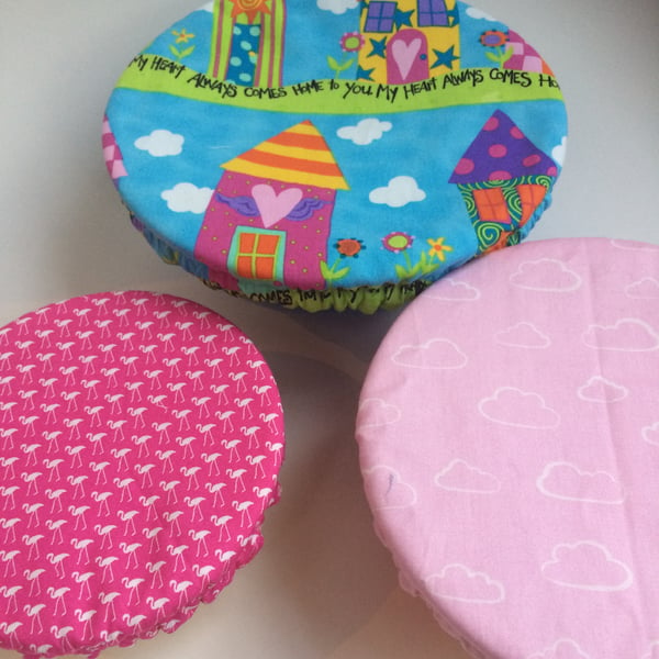 Set of three reusable bowl covers to keep food fresh and safe. In the pink