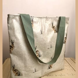 Oilcloth tote bag with recessed zip in Hartley Hare design