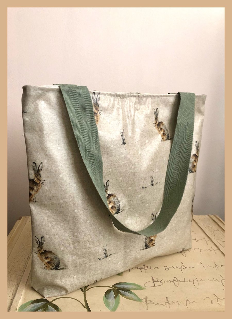 Oilcloth tote bag with recessed zip in Hartley Hare design