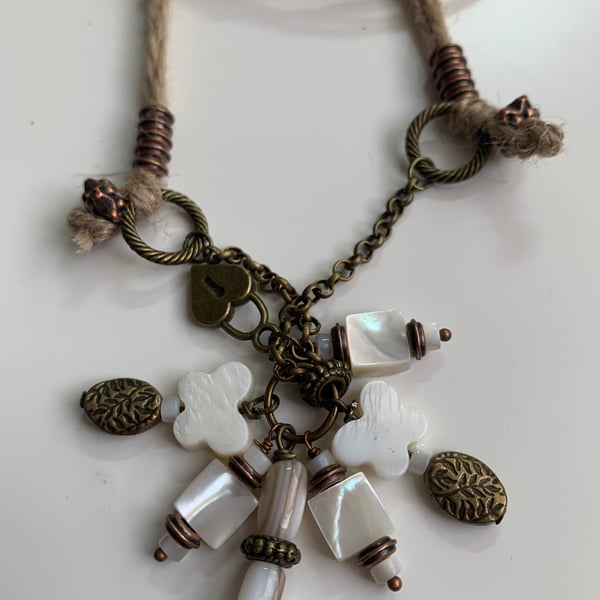 Longline twine and charm necklace