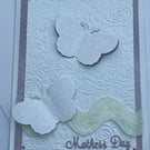 Embossed roses and pretty butterfly Mother's Day card