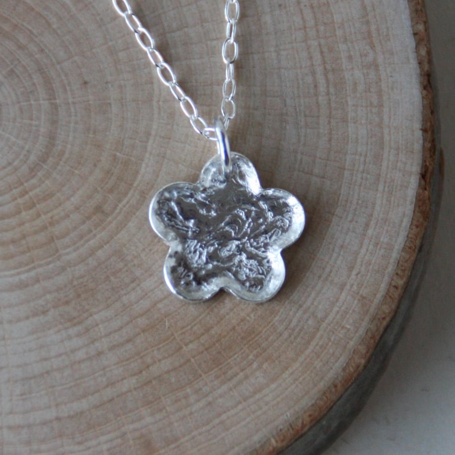 Textured silver flower necklace