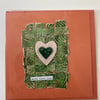 With love card: woven panel with embroidery and felt hearts. Blank inside.