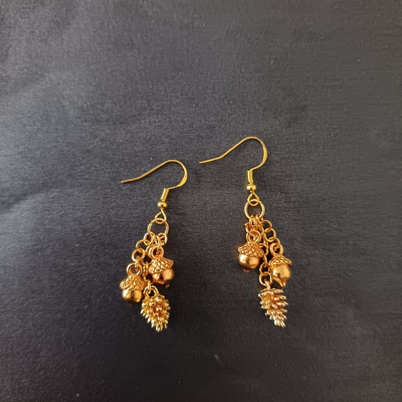 Gold acorn and pine cone charm cascade earrings 