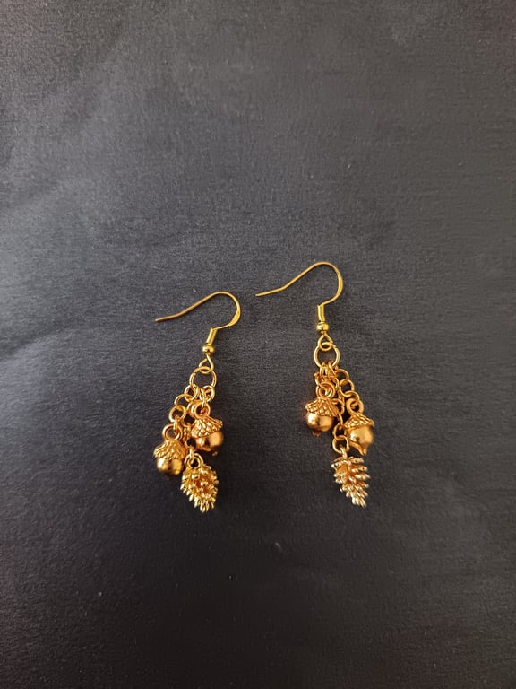Gold acorn and pine cone charm cascade earrings 