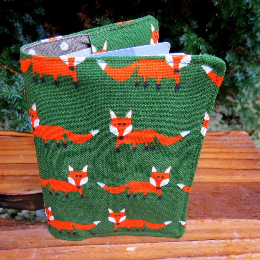 Foxes.  A passport sleeve with a whimsical fox design.  Passport cover.