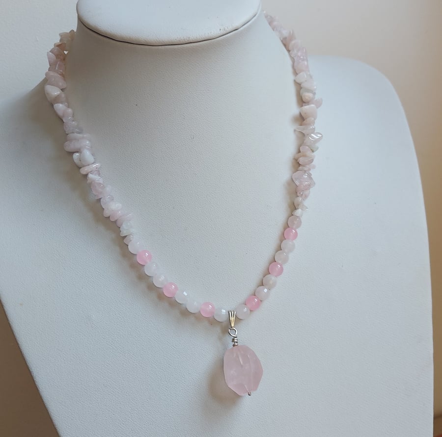 Pink rose quartz necklace with large faceted bead pendant