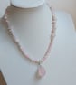 Pink rose quartz necklace with large faceted bead pendant - Image 1
