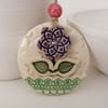 Ceramic decoration with flower button