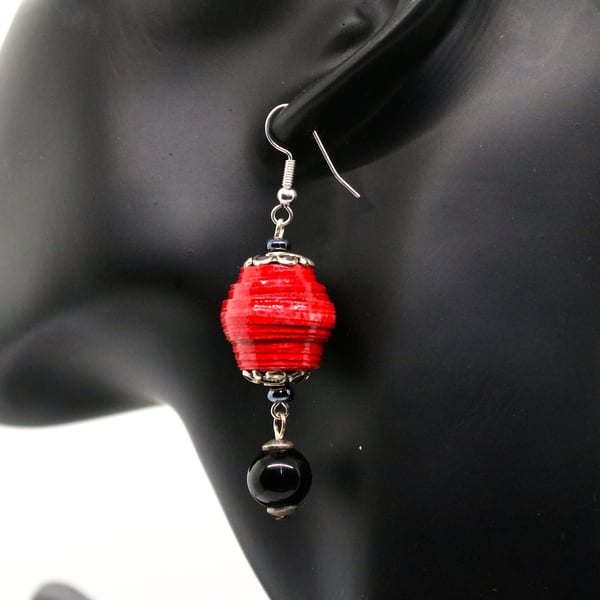 Vibrant Earrings made of round hand rolled paper bead adorned with a black bead