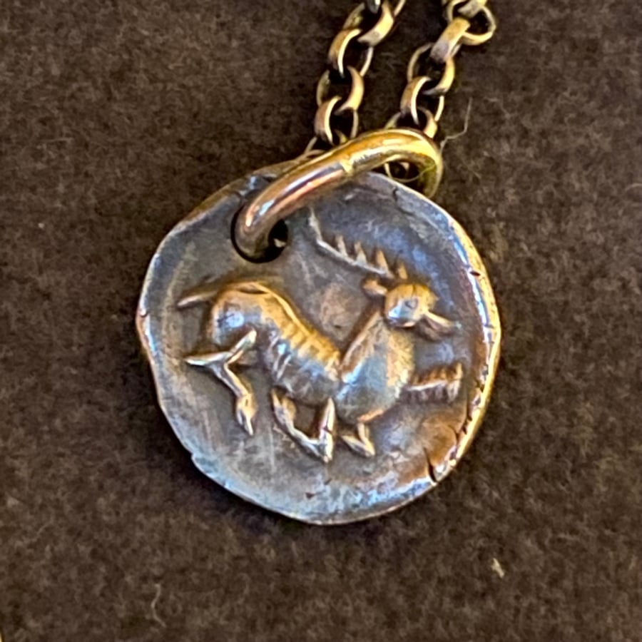 Stag intaglio impression pendant