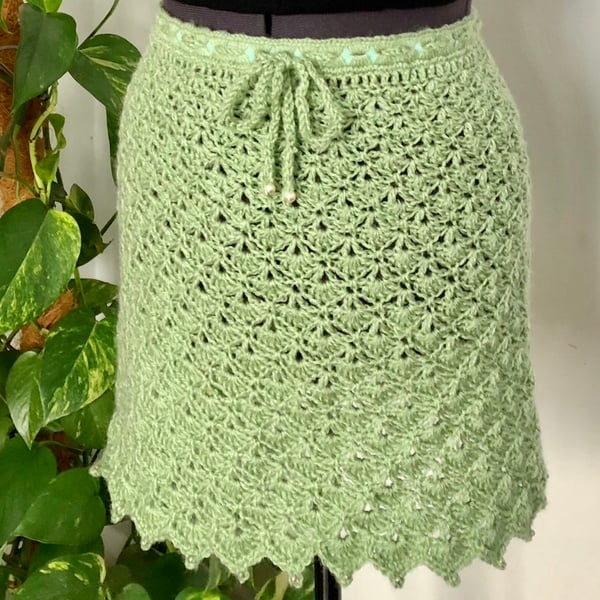 Sage green crochet skirt with beads. Size 8.