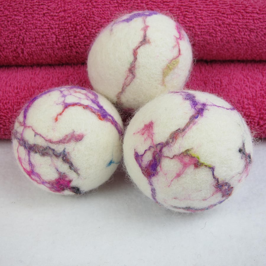 Set of three eco-friendly felt drier balls with silk decoration