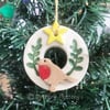 Small robin Christmas wreath pottery decoration