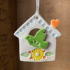 Small Ceramic bird house decoration with orange heart