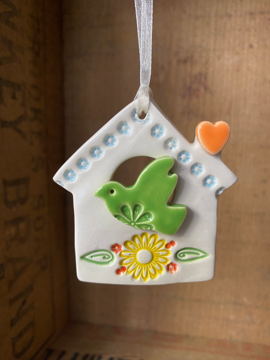 Small Ceramic bird house decoration with orange heart