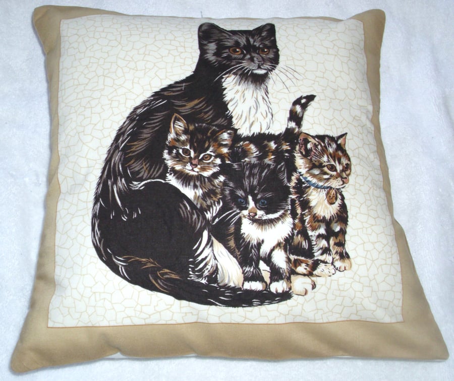 Lovely Black and white cat with her kittens cushion