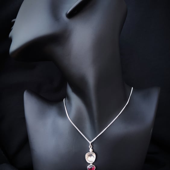 Sterling silver pendant with garnet