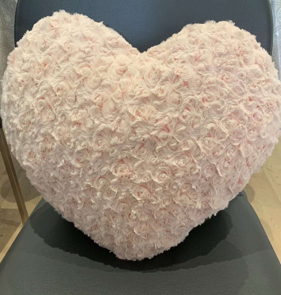 Heart shaped cushion covered in beautiful Rosebud effect soft Plush