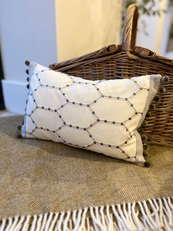 Embroidered cotton and reclaimed linen rectangular cushion cover with pompoms