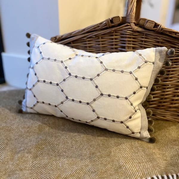 Embroidered cotton and reclaimed linen rectangular cushion cover with pompoms