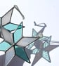Pastel hued white and pale blue green stained glass Christmas star decoration - Image 1