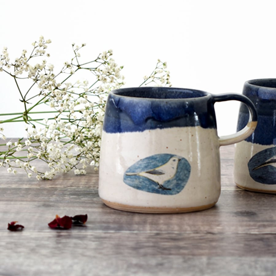 Blue and white ceramic mug with garden bird - handmade illustrated pottery
