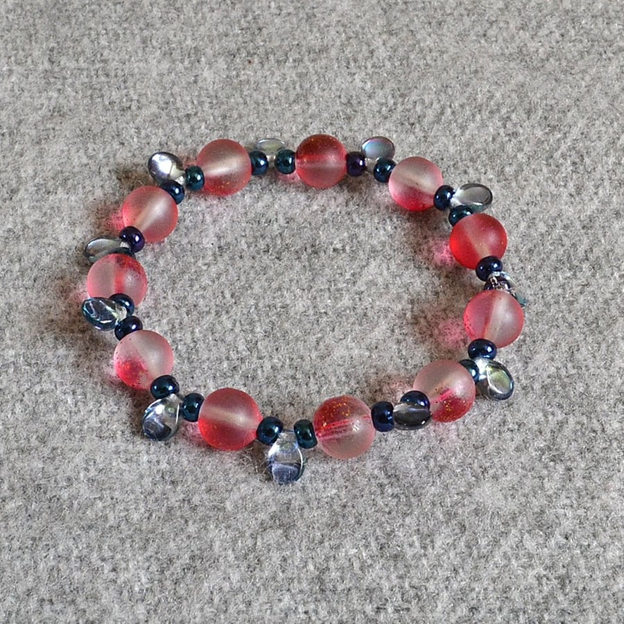 Frosted-Red-Gold Glass Bead Elastic Bracelet with Blue Seed and Pip Bead Accents
