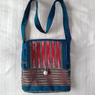 Shoulder bag.  Kingfisher, turquoise, dark red woven fabric