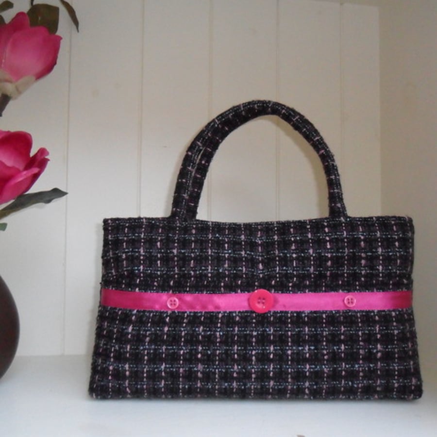    Black and pink handbag