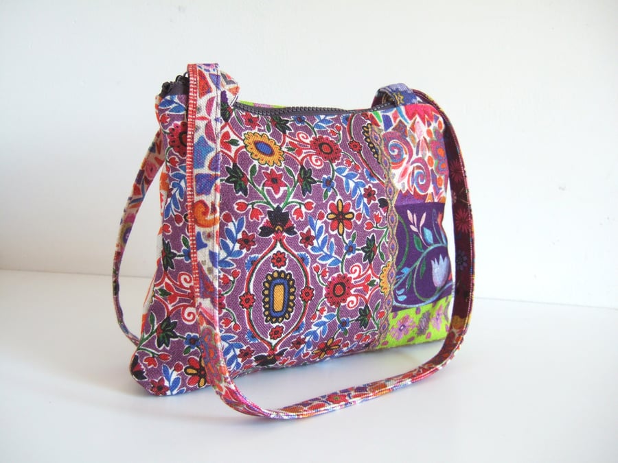 SOLD Shoulder bag or handbag made in a  Folk art print with a chunky zip .