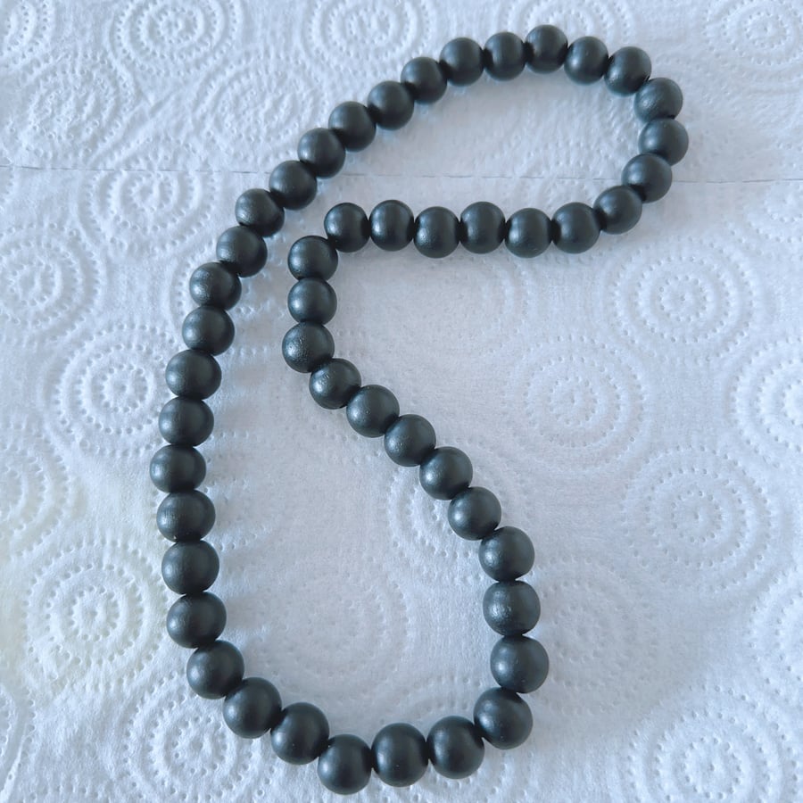 Necklace for Men or Women Made with Matte Black Wood Beads on Elastic code