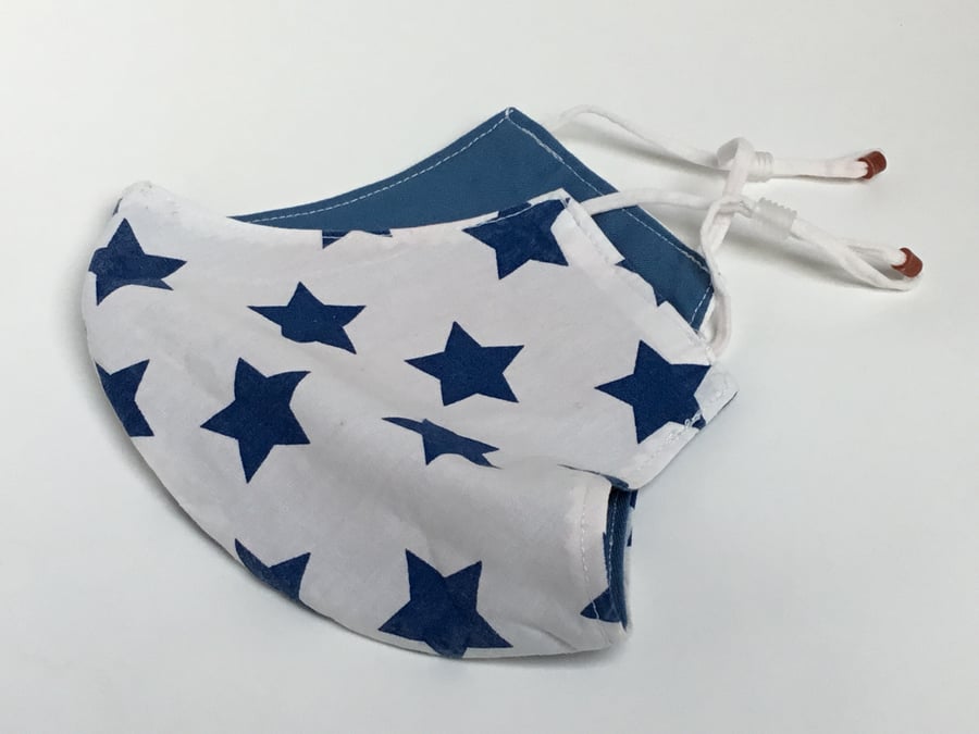 Large reusable double layered, washable and adjustable stars face mask