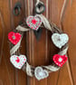 Scandi-style Christmas wreath made from crocheted hearts and ribbon - Image 4