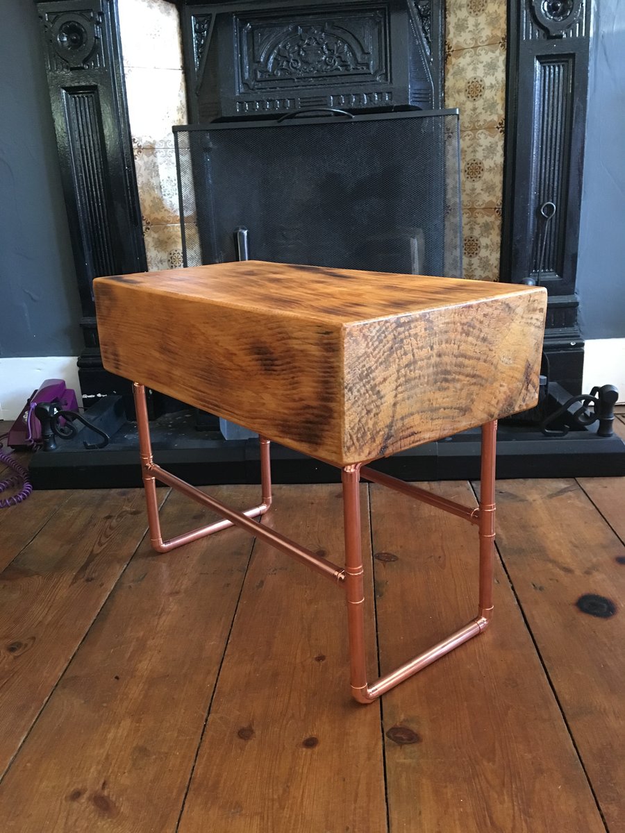 Side table or foot stool. 