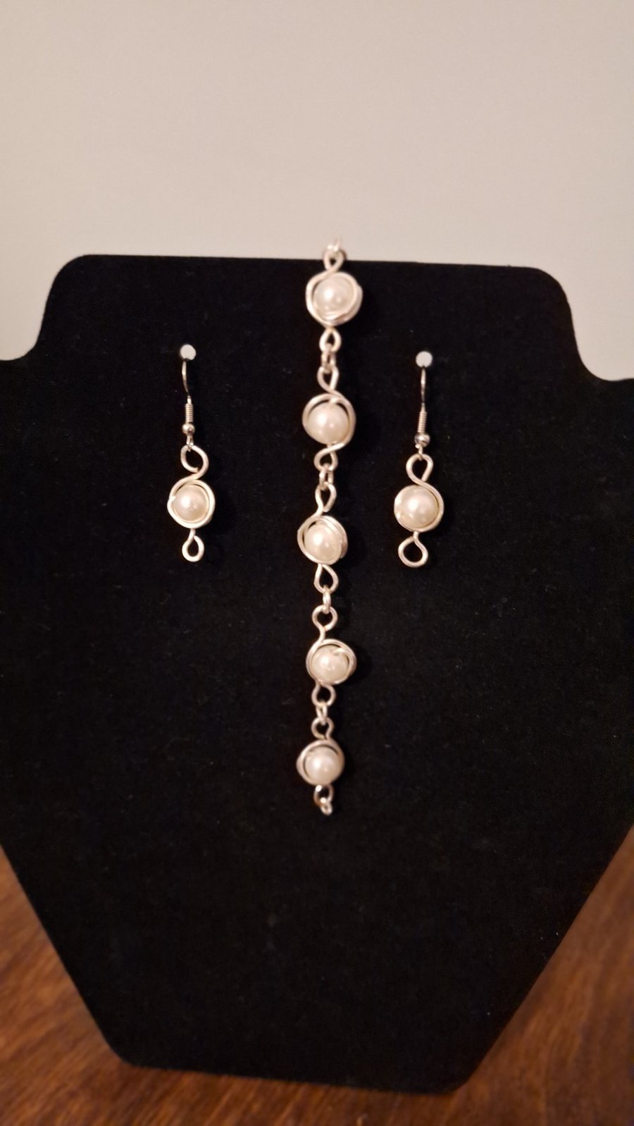 Silver wire wrapped pearl bead bracelet and matching earrings